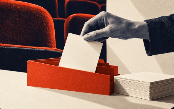 Conceptual collage: a hand filing a blank cream card into an orange card box beside a stack of cards, with red cinema seats behind, suggesting audience feedback kept in order. Not a photograph of the venue.